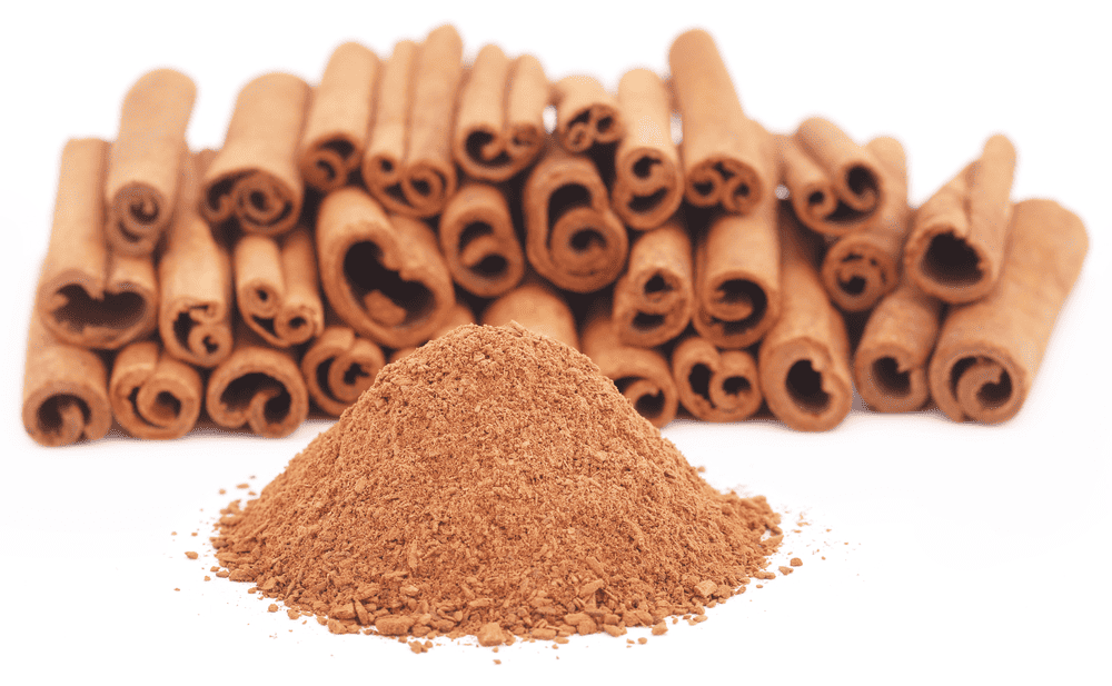 A Person Taking Cinnamon Supplement To Regulate Blood Sugar Levels